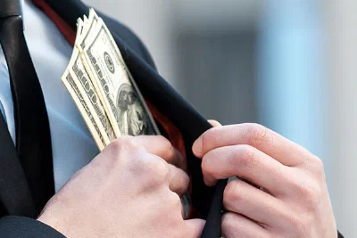 Charged With Embezzlement